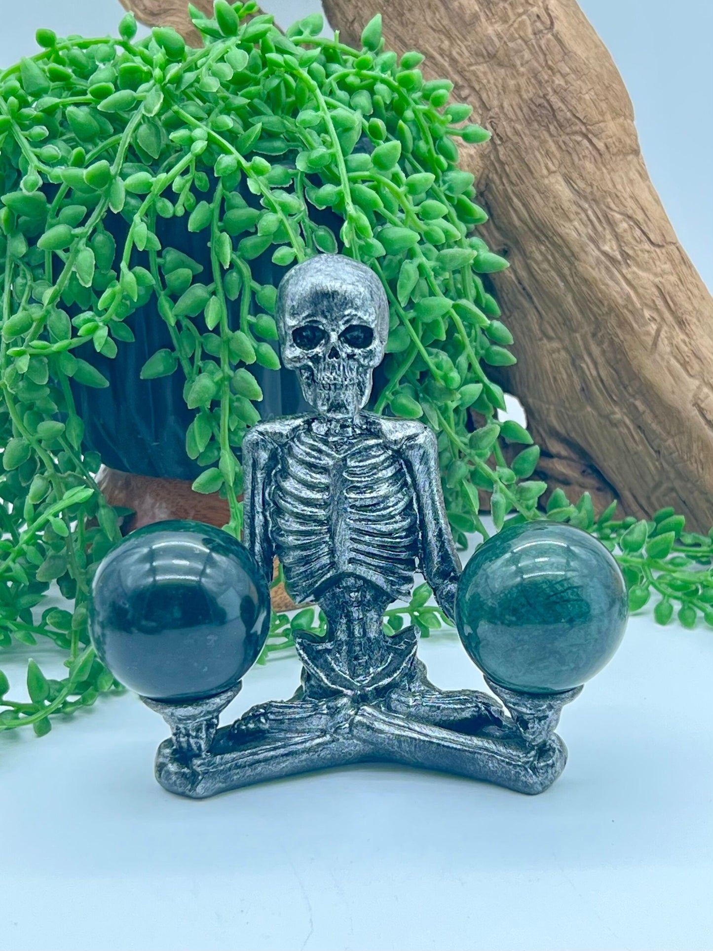 Sitting Skeleton Resin Double Sphere Stand