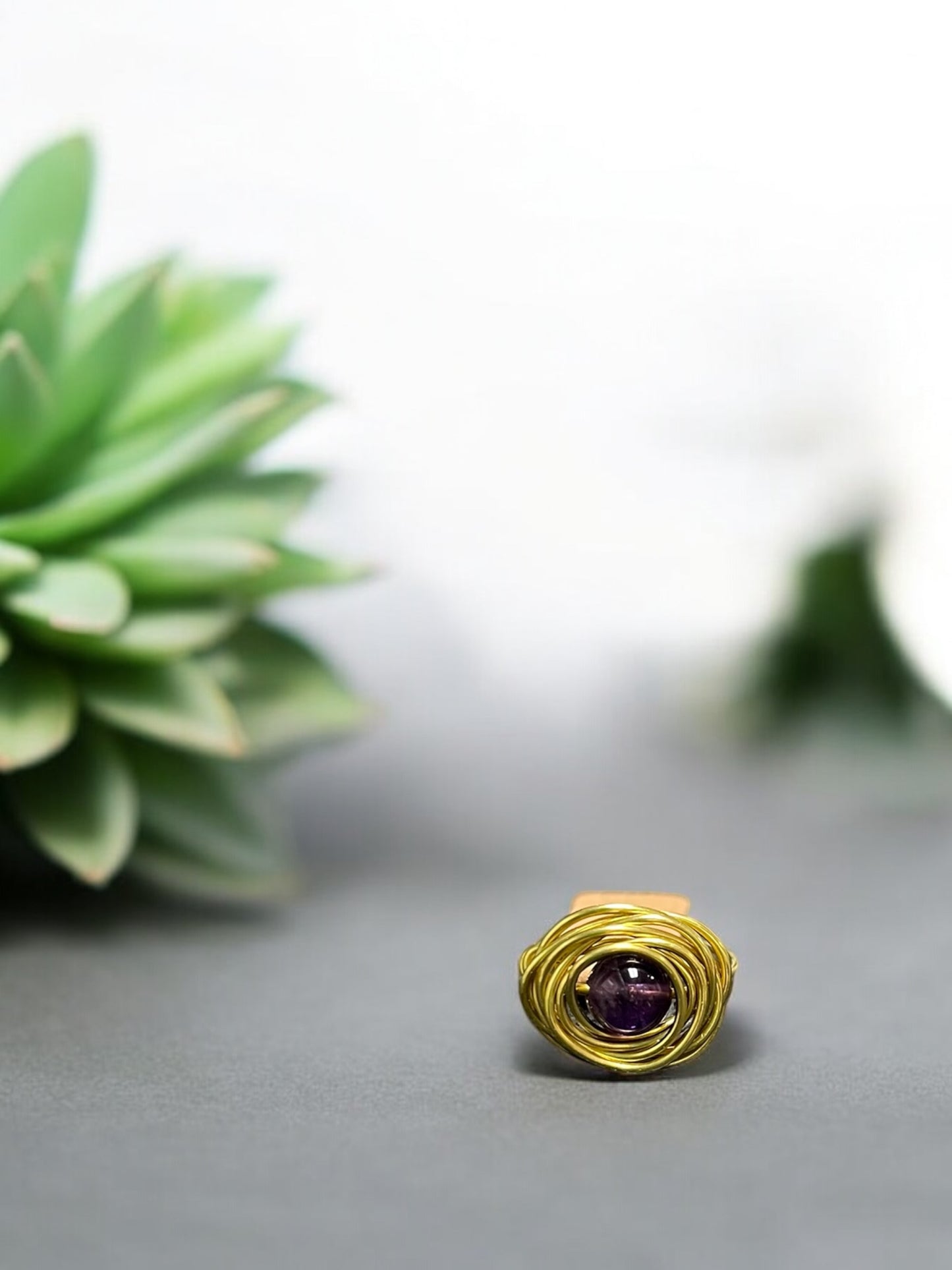 Amethyst in Golden Colored Copper Ring