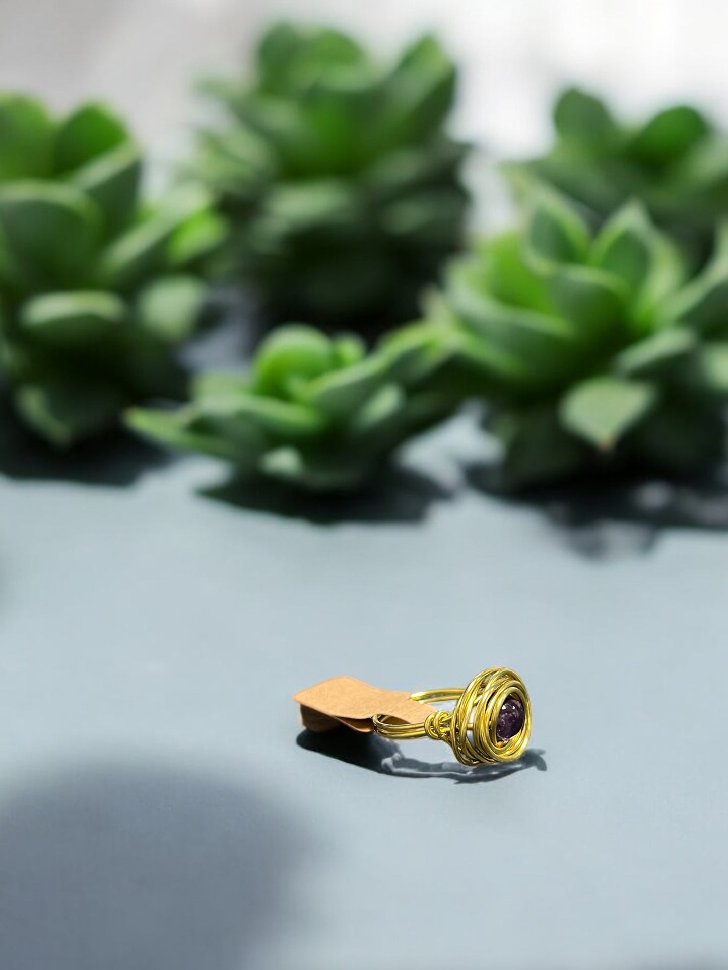 Amethyst in Golden Colored Copper Ring